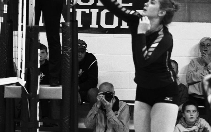 Senior Kiara Aasand records one of her two kills vs. North Border (3 and 10) Photo by Mike Alan Steinfeldt.