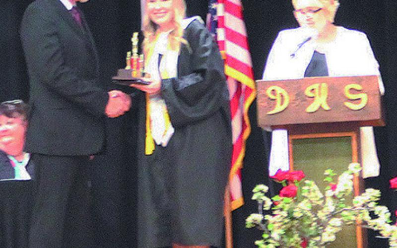 Rylee Maurstad accepted her diploma from Mark Hatloy. Photo by Andrea Johnston