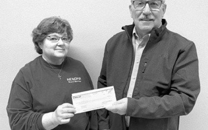 NENDHA board member Bonnie Danielson and Polar board member Gordon Johnson.