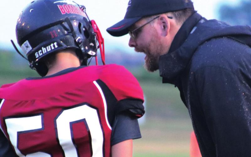 First year head coach Nathan Foster is telling quarterback Gavin Ryan that he did everything right even if the play did not work. VNV photo by Lyle Van Camp