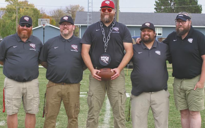 The Bombers coaching staff; from the right, Matt Rarick, Kyle Truesdell, Nathan Foster, Raven Smith, and Joe Jones. Photo by Lyle Van Camp