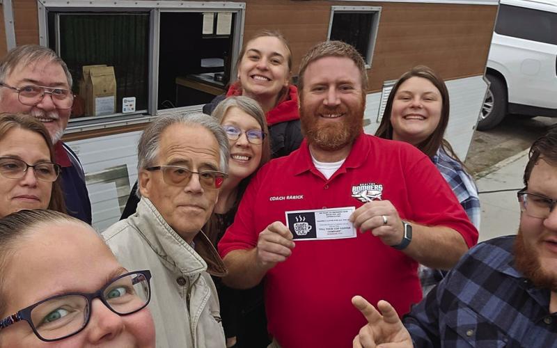 A group of school staff enjoy a coffee of their choice at Fill Your Cup Coffee Company. This was the first event organized by the new PTO group. Photo by Jamie Rarick, courtesy of Bomber’s PTO.