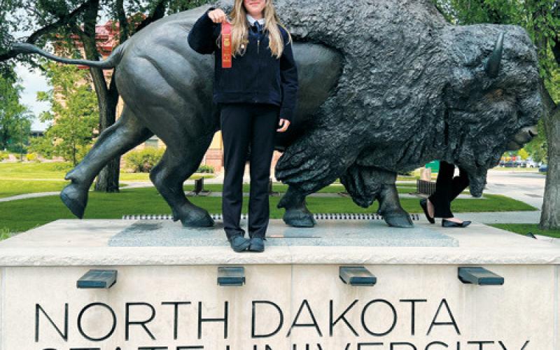 Mackenzie Sherrill who placed in the bronze division for milk quality and dairy products. Photo by Adam Riddle.