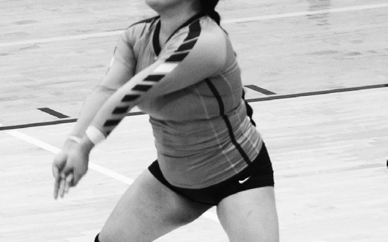 Senior Emily Gonzalez receives a serve. Gonzales led the Titans with nine digs vs. Park River on Sept. 27.