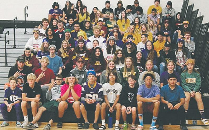 Students sport their hats in the gym on a CASH Day.