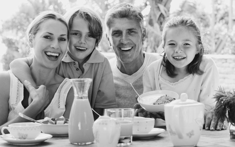 The benefits of eating together as a family apply whether the meals are at home or out and about.
