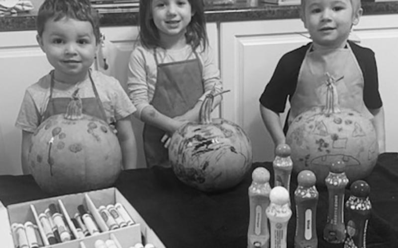 Thank you to Allard Soderfelt for donating pumpkins for the big kids at G &amp;amp; M daycare in Drayton. They had fun decorating them. Pictured are Calvin Helm, Brooklynn Stangeland, and Colton Kerr.
