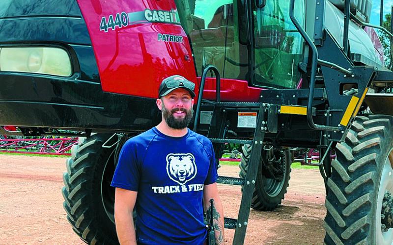Lenci Sickler of Dunn County, fears costs will increase to employ H-2A visa workers under new Department of Labor wage rules. Photo Michael Standaert.