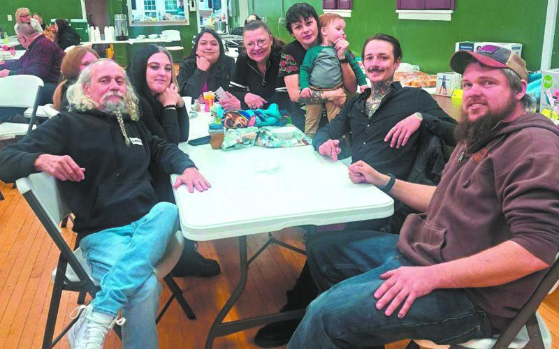 Chris Auen (far left) and his family at the fundraiser benefit last Saturday, Jan. 11. Photo by Christine Jensen