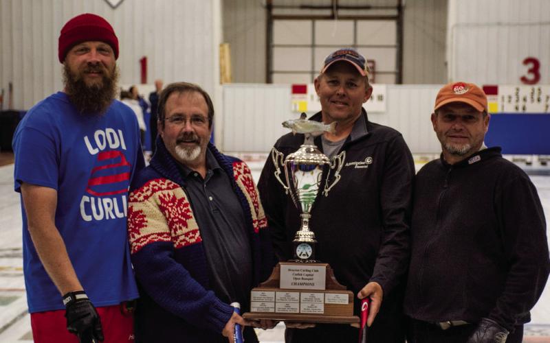 Champion winners - Chris Dolan Rink, St. Paul, MN (L-R): Brian Unbehaun, Ross Harvey, Chris Dolan, and Mark Willmert. Photo by Krystal Wilson.
