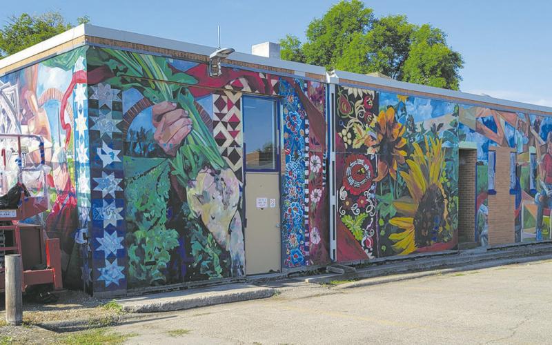 The new mural located on the North and East facing sides of Carnegie Regional Library in Grafton has been taking shape over the past couple of days. Photo by Mike Allen Steinfeldt
