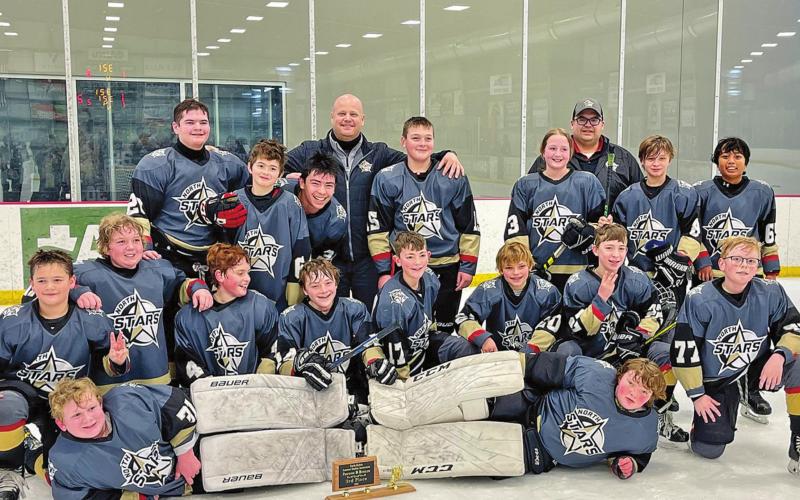 The North Stars Peewee ‘B’ hockey team front from left, Easton Ziegelmann and Kaisin Twamley. Row 2: Max Pokrzywinski, Lincoln Aasand, Austin Estad, Drake Gire, Micah Peschong, Evan Dahl, Laith Hoenke and Ryker Votava. Back: Andrew Flanders, Remington Dahlen, Alex Bercier, coach Matt Peschong, Cal Spoonland, Julia Heidt, assistant coach Nick Ziegelmann, Camden Riske and Adrian Ranta. Photo and story submitted (reprinted courtesy of The Walsh County Record as seen in their March 17, 2021 issue.)