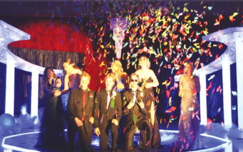 Members of the Class of 2024 celebrate their last DHS Prom with Confetti guns. Photo by Lyle Van Camp