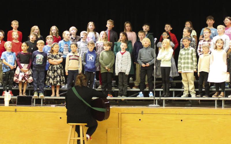 Students in grades one through four closed this year's winter program with 'We Wish You a Merry Christmas.' Photo by Jamie Rarick