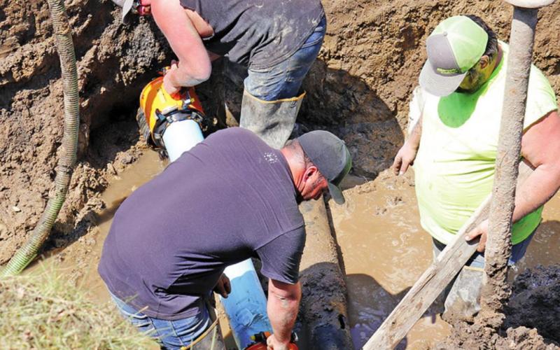 A new section of pipe was used to replace the old damaged section of water line on Friday afternoon. VNV Photo by Lesa Van Camp