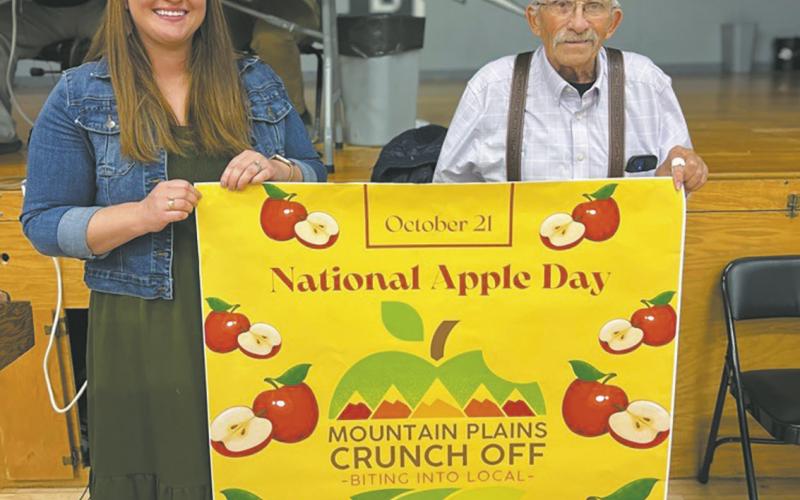School Nurse, Kallie Christenson and apple-growing expert Bob Merrill. Photo by Rachel Lee.
