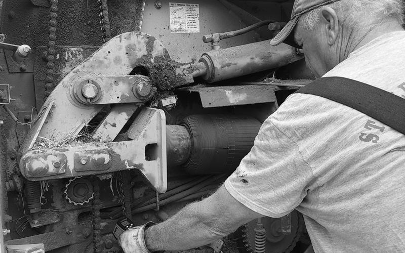 An infrared thermometer can alert farmers of dangerous temperature spikes at the bearings. NDSU photo