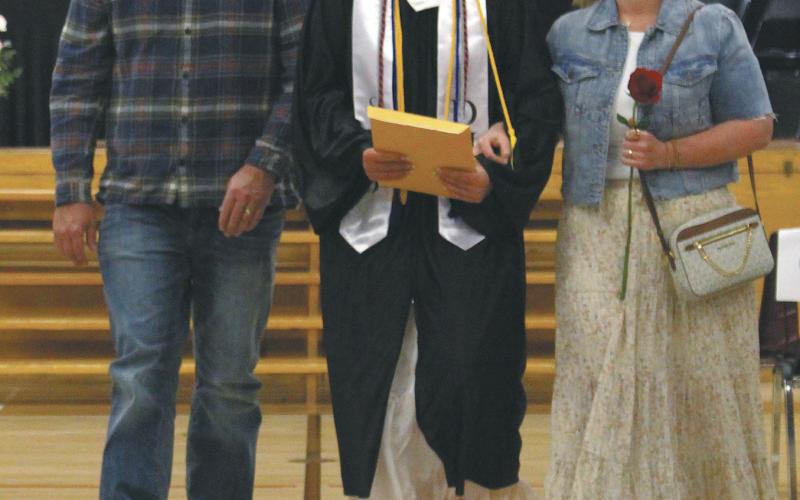 Alyvia Quibell leaving the ceremony as a new graduate of Drayton Public School. Photo by Andrea Johnston