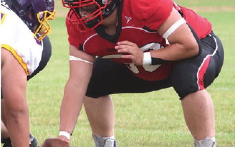 Bryce Wimpfheimer snaps the ball in action against New Town.