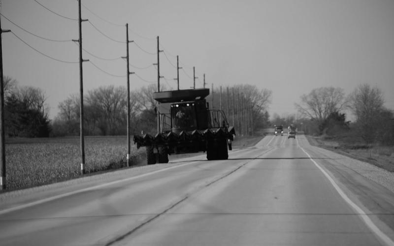 As agricultural producers prepare for harvest season, it is crucial for motorists and farm equipment operators to share the road to prevent roadway collisions. (Photo by Central States Center for Agricultural Safety and Health (CS-CASH))