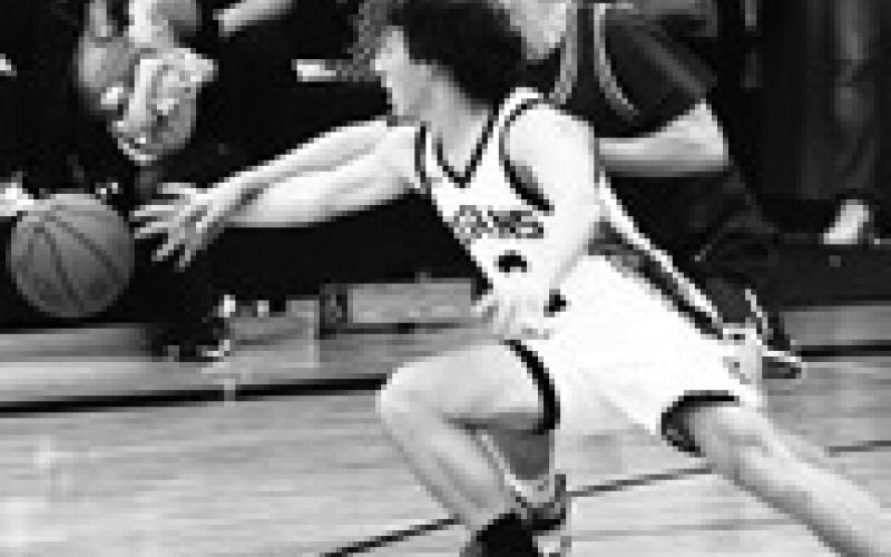 Logan Wieler fights a Thunder defender for control of the ball. Photo by Lyle Van Camp.
