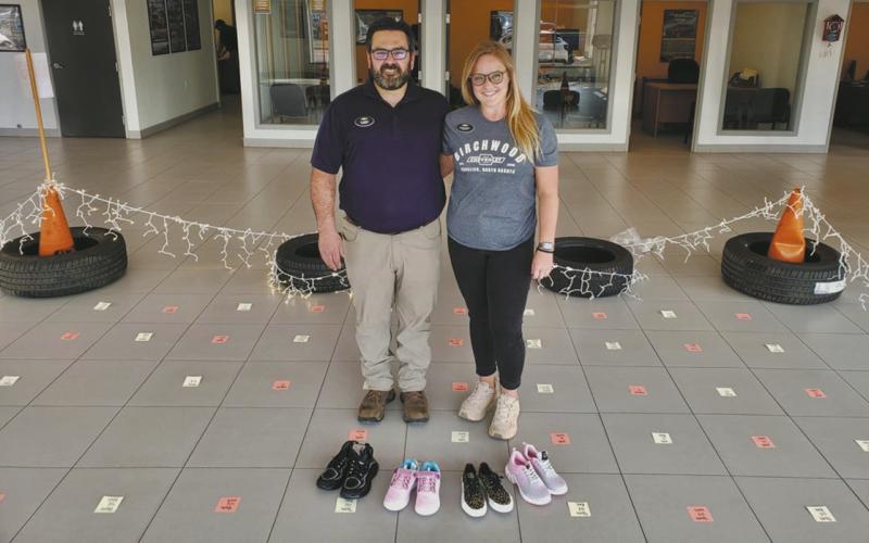 Al &amp;amp; Chris Berry hope to have a “pair for every square” at the end of the shoe drive. Submitted photo