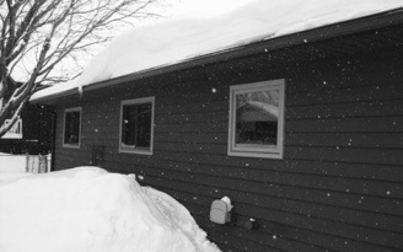Most roofs are designed to handle the snow load of a typical winter. (NDSU photo)
