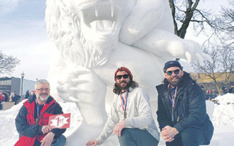 Team North Dakota won first place in the U.S. National Snow Sculpting Championship in Lake Geneva, Wisc. Pictured are Jay Ray, Mike Nelson, and Langdon native Josh Zeis. The trio also earned first place honors in the People’s Choice Awards for their sculpture 'The Nemean Lion.' Photo courtesy Jay Ray.