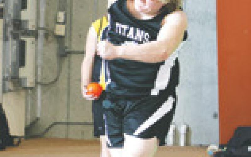Bryce Wimpheimer's second attempt at the shot put. Photo by Lyle Van Camp.