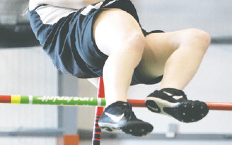 Alyssa Hoyles clears the bar in the girls pole vault. Photo by Lyle Van Camp.