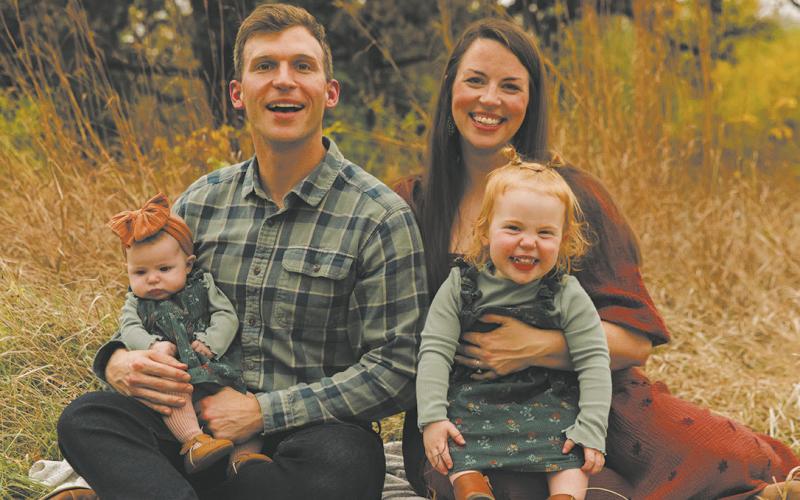 Levi and Rachel Bachmeier with daughters Roslin (left) and Linden (right).