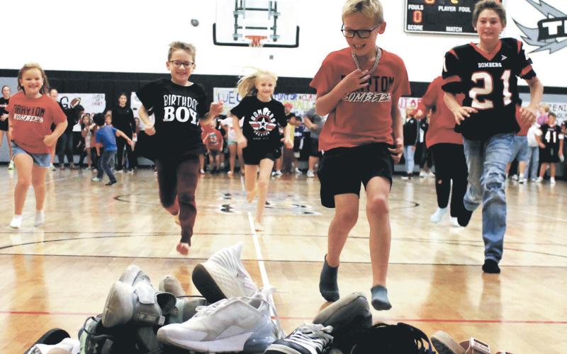 Elementary students got in on the homecoming fun with a shoe relay as part of Friday’s homecoming games. Photo by Jamie Rarick.