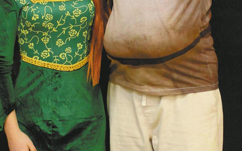 Going all out, juniors Hope Patterson and Maddox Oihus dressed as Fiona and Shrek for 'Movie Day' during homecoming week. Photo by Jamie Rarick