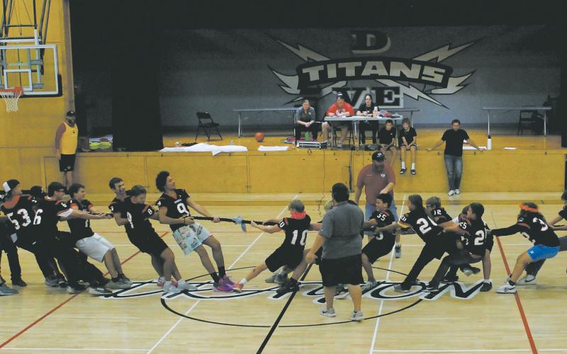 Junior high football players took on the varsity team for tug-of-war during Friday’s pep rally in the gym. Photo by Jamie Rarick.