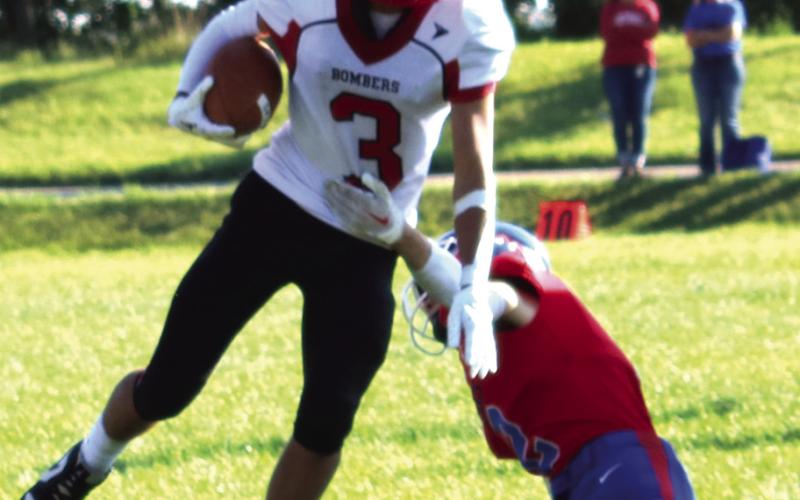 Trenten Bronson-Keena tries to break free from a Center Stanton defender. Photo provided by Drayton Public School.