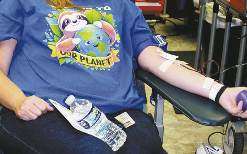 DPS staff member Angi Aasand was one of many caring donors at last week’s blood drive at the school. Photo by Jamie Rarick.