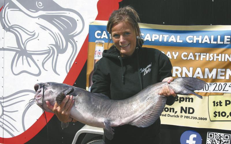 Anna Sjol from East Grand Forks won day one’s biggest fish prize with a 22.63 pound catfish. Submitted photo.