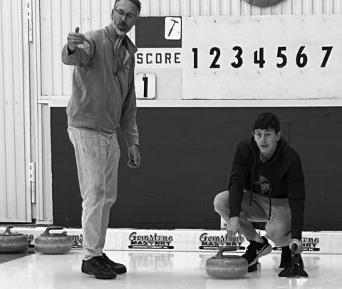 Christopher Longtin takes instruction from Tom Grzadzieleski. Photo courtesy of Pembina County 4-H