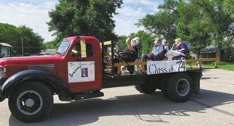 The class of 1974 dedicated their float to a lost classmate at the St. Thomas Daze parade. Photo by Kathryn Sisk