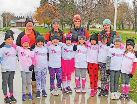 The BIO girls pose for a picture before starting their 5K run. Pictured left to right are: front row Shea Aasand, Evie Hillier, Molly Grundstrom, Marissa Grundstrom, Paige Tunks, Lana Kalka, Ruthie Rarick, Hailey Ladouceur, Brynlee Christenson, and Natalie Helm. Back row: Katie Dahl, Stephanie Woinarowicz, Christie McFarland, and Maggie Vold. Photo submitted by Jamie Rarick