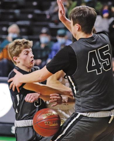 Sam Johnson and Gage Pollestad double team a North Border Eagle to keep him from scoring in the Region II Tournament game Monday afternoon. VNV photo by Lesa Van Camp