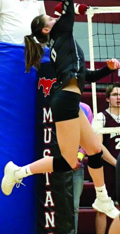 Emilee Reilly goes up for the spike in Minto against the Mustangs in the last regular season game. VNV Photo by Lesa Van Camp