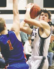 Everett Fedje tries to shoot through the Benson County defense. Photo by Lyle Van Camp.