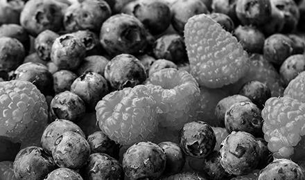 Raspberries and blueberries get their vibrant color from anthocyanin pigments, which may provide heart health benefits and reduce cancer risk. Pixabay photo