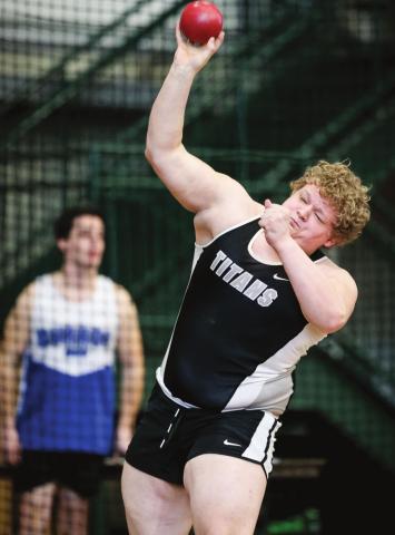 Bryce Wimpfheimer puts the shot during the Red River Valley Conference Indoor Track Meet last Friday Night at UND . Photo by Cole Short courtesy of Hillsboro Banner