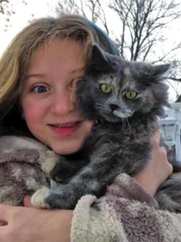 Pictured: Kassidee and her hero kitten Sage. Photo submitted