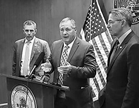 Agriculture Commissioner Doug Goehring, center, discusses two loan programs developed by the Bank of North Dakota to provide financial relief to agriculture producers in the state. Gov. Kelly Armstrong, left, Attorney General Drew Wrigley, right, and Goehring compose the North Dakota Industrial Commission. (Photo by Jacob Orledge/North Dakota Monitor)