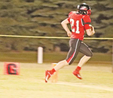 Cayden Quibell runs in the Bombers only touchdown late in the Homecoming game against Midway Minto last Friday night. VNV Photo by Lesa Van Camp