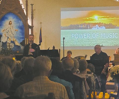 Andrew Danielson, Ian Petrerson and John Maxwell performing at “The Power of Music.” Photo by Christine Jensen