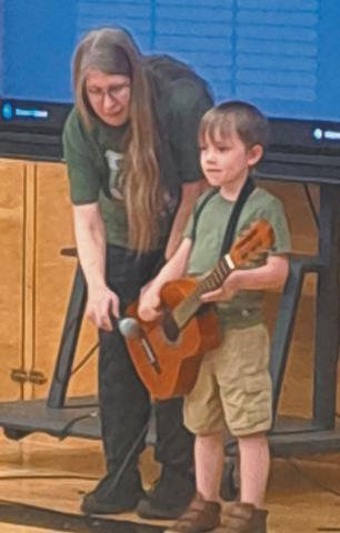 Mac Vold, son of Matt and Maggie Vold, was one of the young performers at the DPS talent show May 14. Photo by Christine Jensen